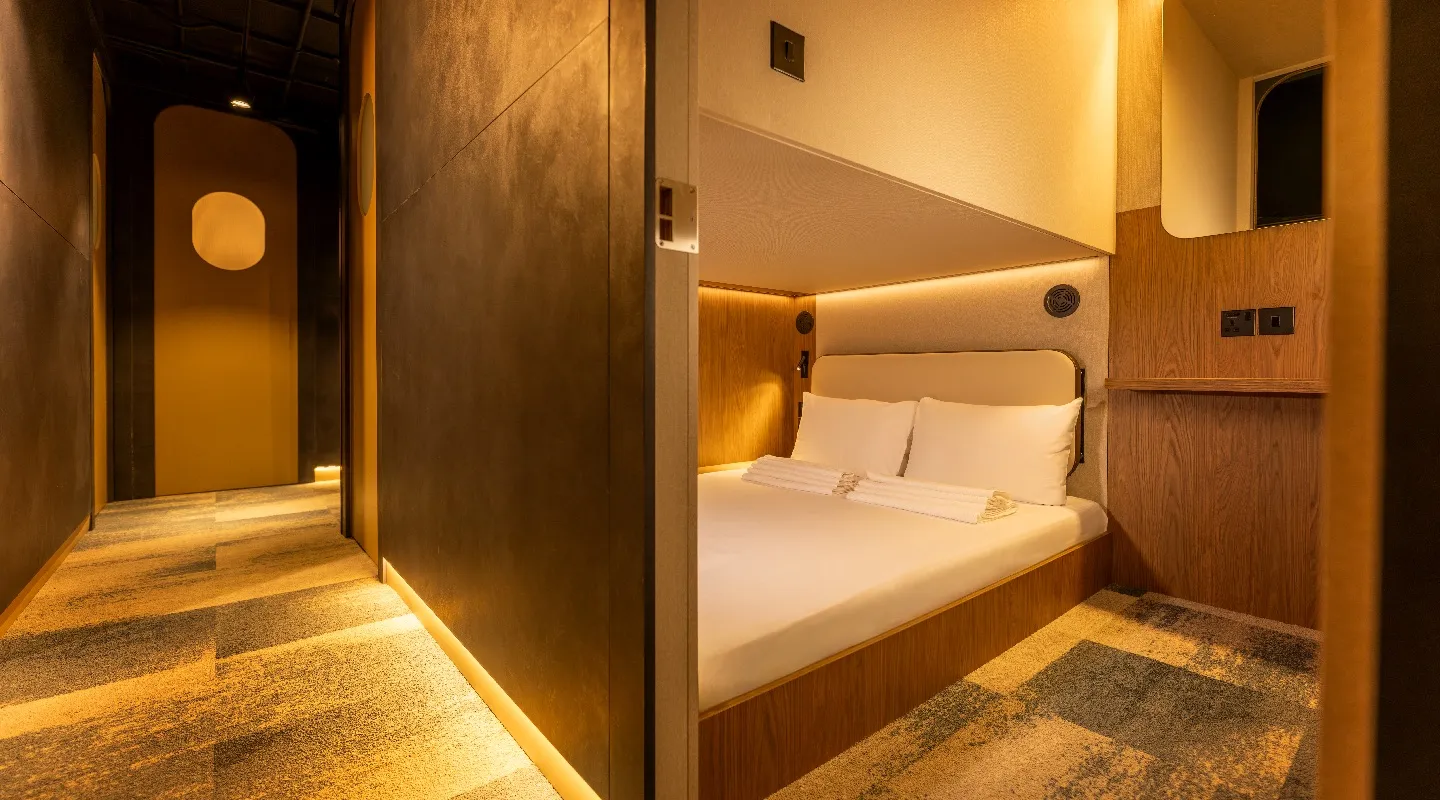 A clean and warm Kabannas Cabin and hallway in soft lighting