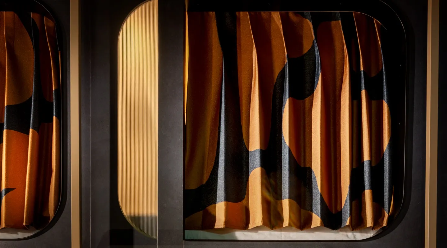 A cosy Kabannas Pod in with the curtain drawn